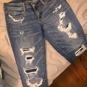 light washed ripped jeans cropped